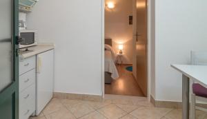 Kuchyňa alebo kuchynka v ubytovaní Apartments in Trogir