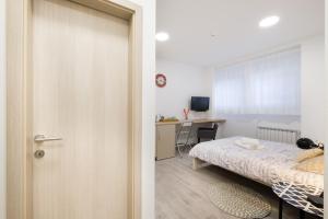 Ένα ή περισσότερα κρεβάτια σε δωμάτιο στο Apartments Lucky Place