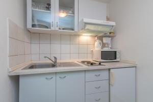 Kuchyňa alebo kuchynka v ubytovaní Apartments in Trogir