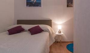 Posteľ alebo postele v izbe v ubytovaní Apartments in Trogir
