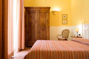 Ένα ή περισσότερα κρεβάτια σε δωμάτιο στο Hotel Mergellina