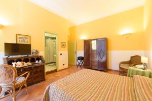 TV a/nebo společenská místnost v ubytování Hotel Mergellina