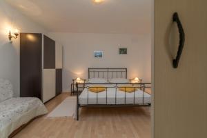 Posteľ alebo postele v izbe v ubytovaní Apartments in Trogir
