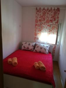 En eller flere senge i et værelse på Apartment Visoka