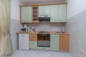Kuchyňa alebo kuchynka v ubytovaní Apartments in Trogir