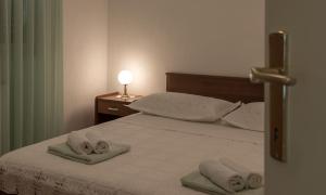 Posteľ alebo postele v izbe v ubytovaní Apartments in Trogir