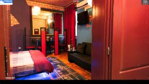 Krevet ili kreveti u jedinici u okviru objekta Rimini Club Inn & Suites