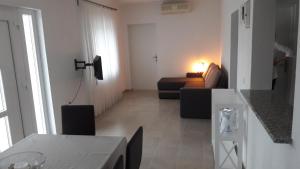 Postel nebo postele na pokoji v ubytování Apartman Marco