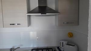 Kuchyň nebo kuchyňský kout v ubytování Apartman Marco