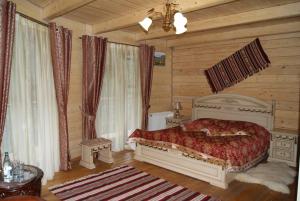 Кровать или кровати в номере Отель Дикий Мёд