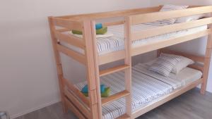 Postel nebo postele na pokoji v ubytování Apartman Marco