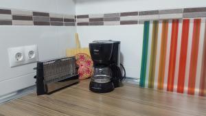 a coffee maker sitting on top of a counter at jp - 2.0 in Benalmádena