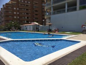 Basen w obiekcie Luxury Apartment 1ª linea de playa Marina D'Or lub w pobliżu