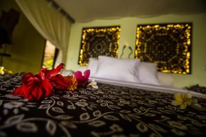 Cama ou camas em um quarto em Zen Resort Bali