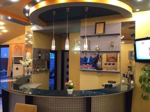 a bar in a restaurant with a counter at Boutique Hotel Royal in Nesebar