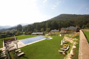 an aerial view of a resort with a swimming pool at Areal in Viveiro