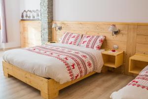 Postelja oz. postelje v sobi nastanitve Albergo Rotenthal