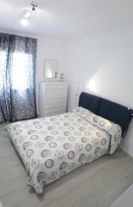 Ein Bett oder Betten in einem Zimmer der Unterkunft apartament Sant Pere