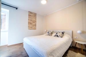 Posteľ alebo postele v izbe v ubytovaní Emma appartment