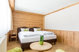Postel nebo postele na pokoji v ubytování Hotel Gerbe