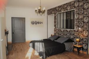 Postel nebo postele na pokoji v ubytování La maison de Thiré