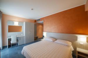 Postel nebo postele na pokoji v ubytování Hotel Testani Colleferro