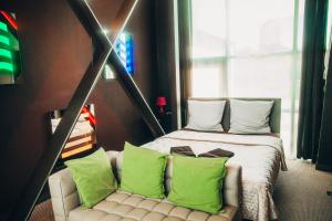 Кровать или кровати в номере Гостиница в Маяке