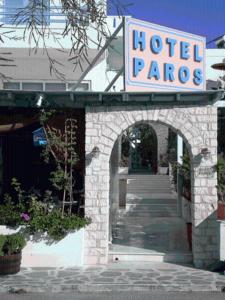 an entrance to a hotel with a sign on it at Hotel Paros in Parikia