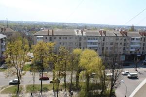 an aerial view of a city with a building at Apartment on Fastivs'ka 2 in Bila Tserkva