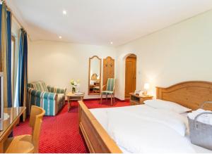 Ένα ή περισσότερα κρεβάτια σε δωμάτιο στο Hotel Stefanshof