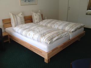 Cama o camas de una habitación en Hotel Hahnenblick