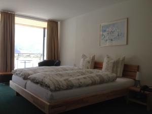 Cama o camas de una habitación en Hotel Hahnenblick