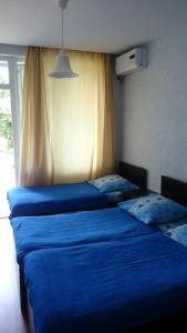 Letto o letti in una camera di Hotel Aurora