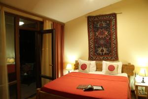 Voodi või voodid majutusasutuse Silk Road Hotel toas