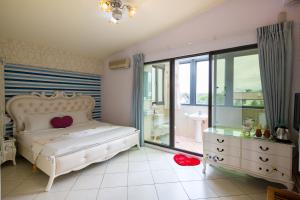 Postel nebo postele na pokoji v ubytování Slow Fly B&B