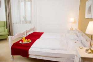 Postel nebo postele na pokoji v ubytování Hotel Veduta