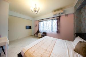 Postel nebo postele na pokoji v ubytování Slow Fly B&B