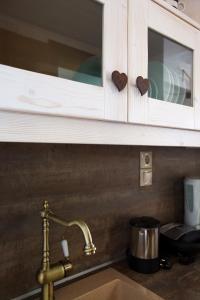 a kitchen counter with a sink and a counter top at Mistral-Patmos in Patmos