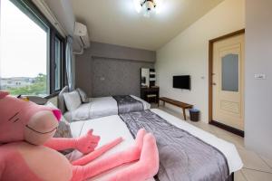 Postel nebo postele na pokoji v ubytování Slow Fly B&B