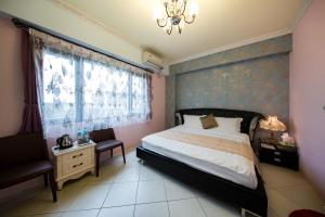 Postel nebo postele na pokoji v ubytování Slow Fly B&B