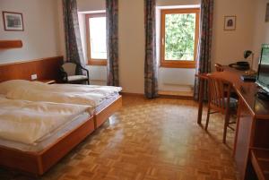 Postel nebo postele na pokoji v ubytování Auberge de la Réunion