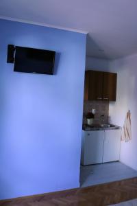 Kuchyň nebo kuchyňský kout v ubytování Apartments Milatic