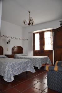 Posteľ alebo postele v izbe v ubytovaní Posada la Torre