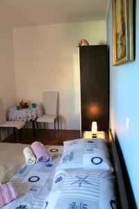 Postel nebo postele na pokoji v ubytování Apartments Milatic