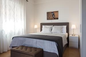 Apartments Nino 1客房内的一张或多张床位