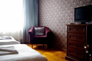 Postel nebo postele na pokoji v ubytování Villand Hotel with Free Private Parking and Self Check In