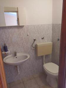 Koupelna v ubytování Apartmani "Ivan"