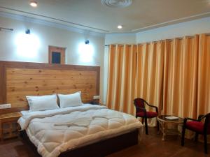 Postel nebo postele na pokoji v ubytování Shaolin Ladakh