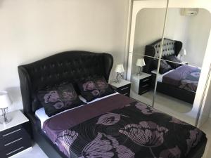 Кровать или кровати в номере Apartment Apollo