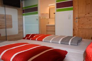 Posteľ alebo postele v izbe v ubytovaní Ferienwohnung Trixl